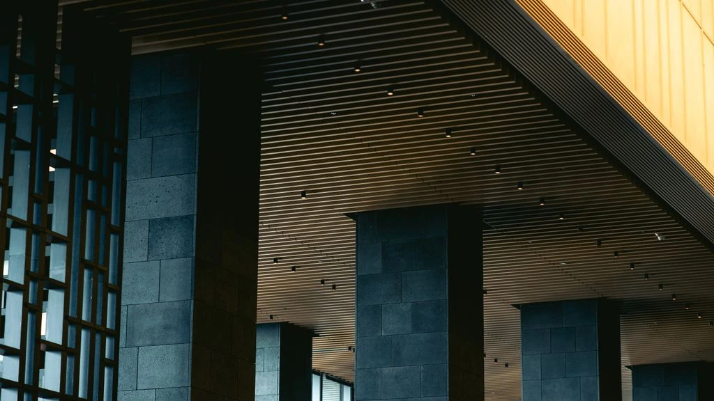 Aman Tokyo lobby atrium with washi-paper ceiling and timber lattice